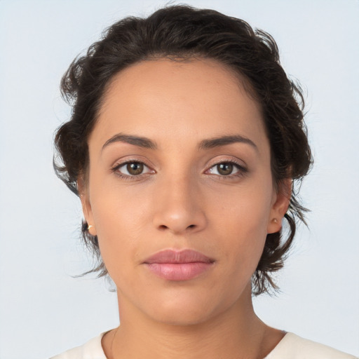 Neutral white young-adult female with medium  brown hair and brown eyes