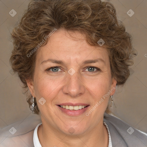 Joyful white adult female with short  brown hair and grey eyes