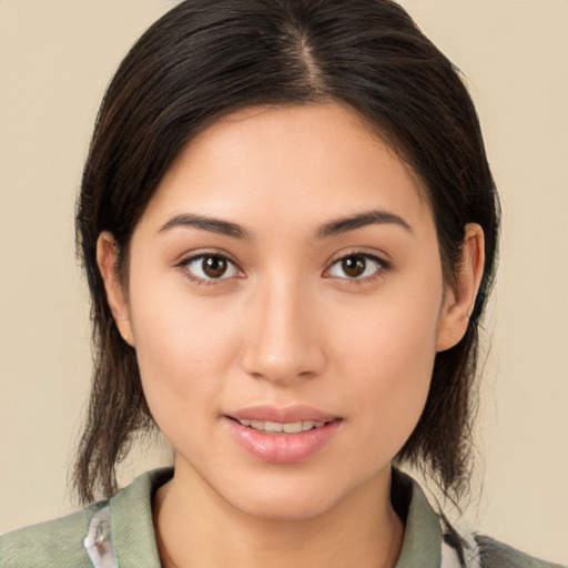 Joyful white young-adult female with medium  brown hair and brown eyes