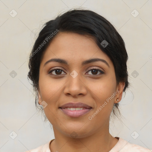 Joyful latino young-adult female with medium  black hair and brown eyes