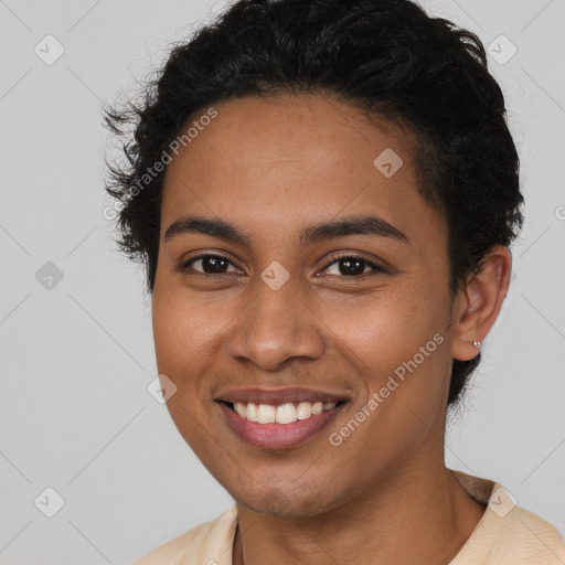 Joyful latino young-adult female with short  brown hair and brown eyes