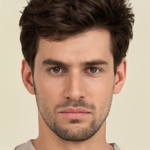 Neutral white young-adult male with short  brown hair and brown eyes