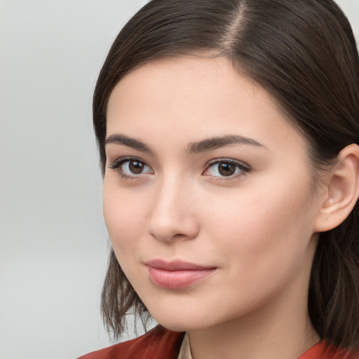 Neutral white young-adult female with long  brown hair and brown eyes