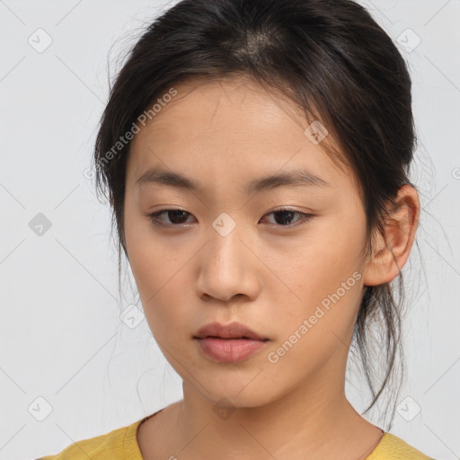 Neutral asian young-adult female with medium  brown hair and brown eyes