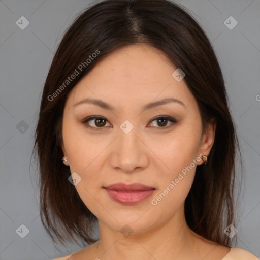 Joyful latino young-adult female with medium  brown hair and brown eyes