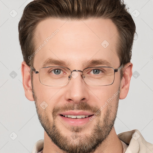 Joyful white adult male with short  brown hair and grey eyes