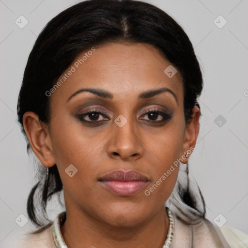 Joyful latino young-adult female with medium  brown hair and brown eyes