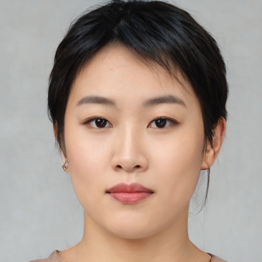 Neutral asian young-adult female with medium  black hair and brown eyes
