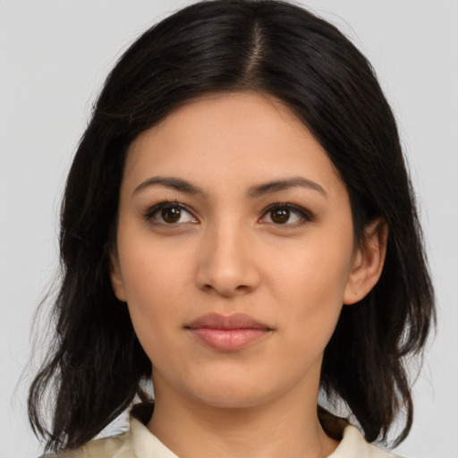 Neutral latino young-adult female with medium  brown hair and brown eyes