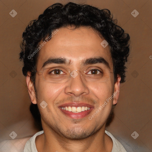 Joyful latino young-adult male with short  brown hair and brown eyes