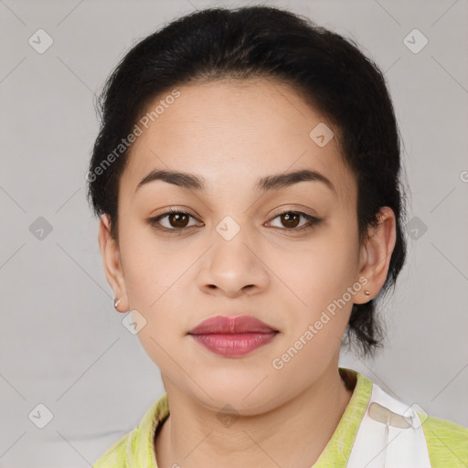 Joyful latino young-adult female with medium  brown hair and brown eyes