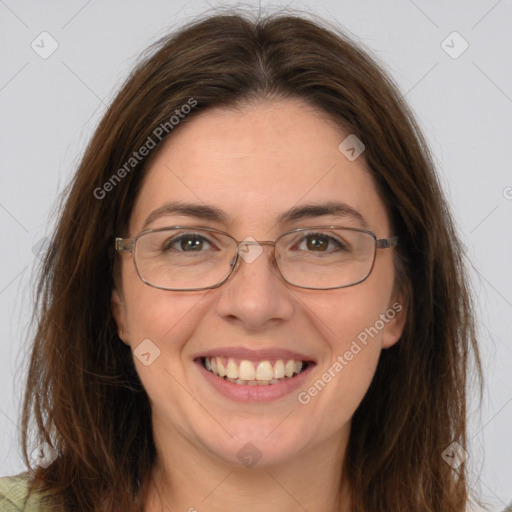 Joyful white young-adult female with long  brown hair and green eyes