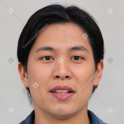 Joyful asian young-adult male with medium  brown hair and brown eyes