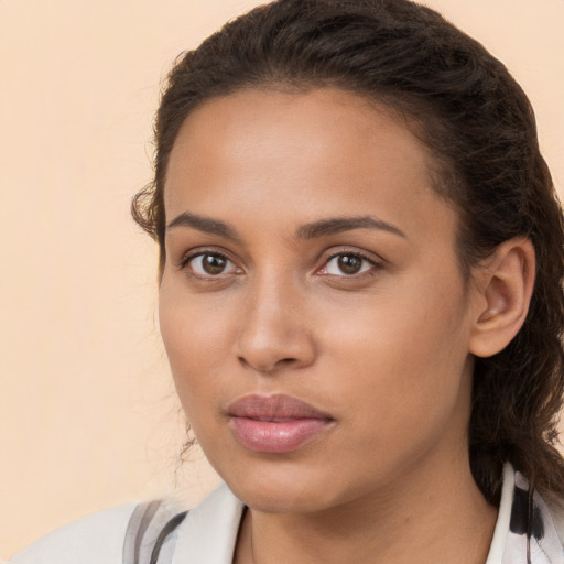 Neutral white young-adult female with medium  brown hair and brown eyes