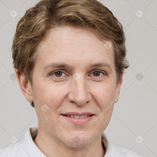 Joyful white adult female with short  brown hair and grey eyes