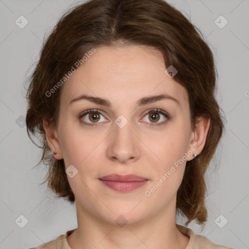 Joyful white young-adult female with medium  brown hair and green eyes