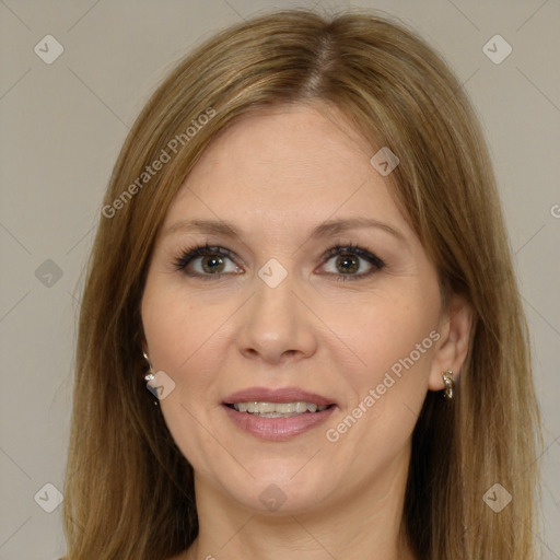 Joyful white adult female with long  brown hair and brown eyes