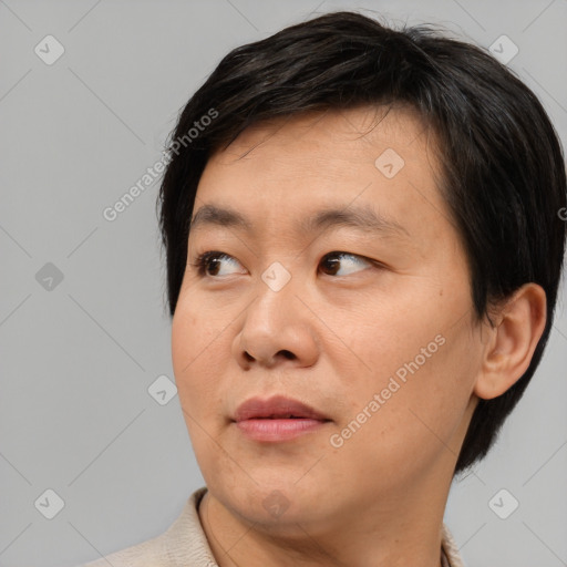 Neutral asian young-adult male with short  brown hair and brown eyes