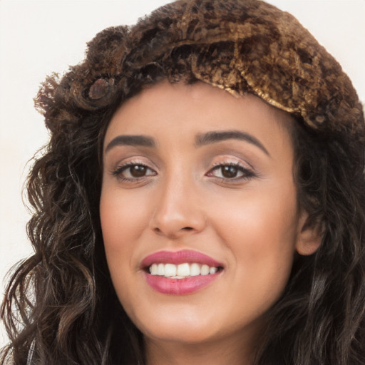 Joyful white young-adult female with long  black hair and brown eyes