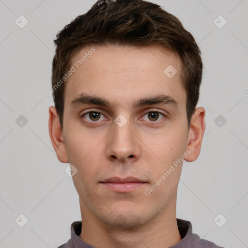 Neutral white young-adult male with short  brown hair and grey eyes