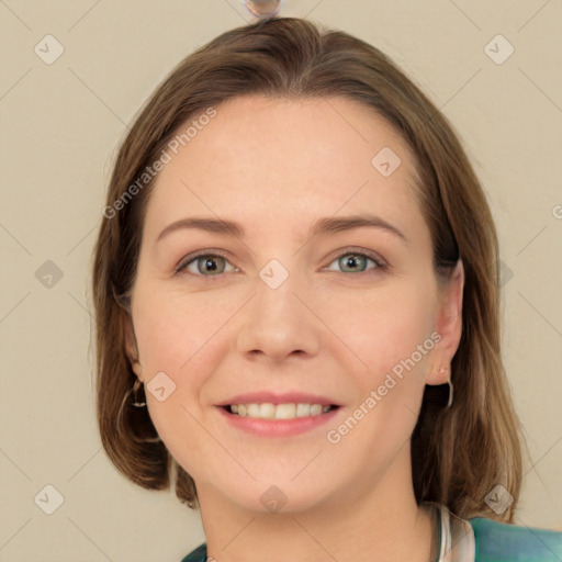 Joyful white young-adult female with long  brown hair and green eyes