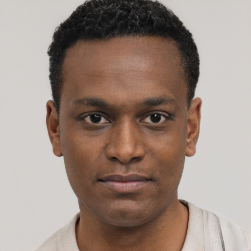 Neutral black young-adult male with short  brown hair and brown eyes
