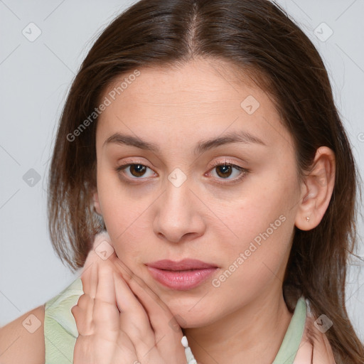 Neutral white young-adult female with medium  brown hair and brown eyes