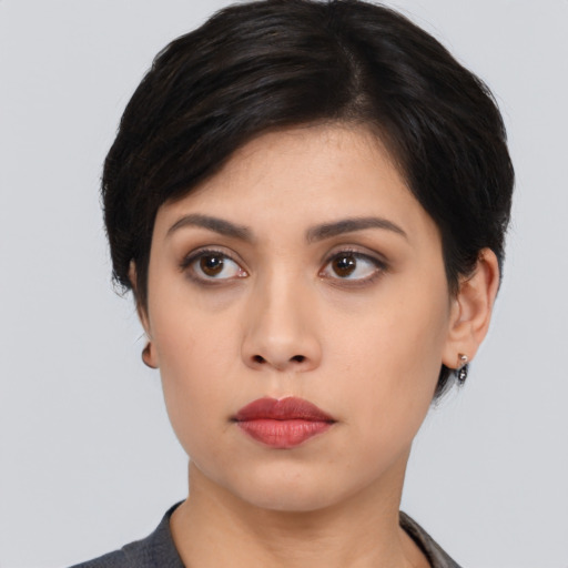 Neutral asian young-adult female with medium  black hair and brown eyes