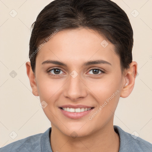 Joyful white young-adult female with short  brown hair and brown eyes