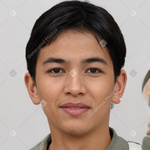 Joyful white young-adult male with short  black hair and brown eyes