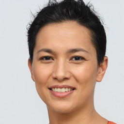 Joyful asian young-adult female with short  brown hair and brown eyes