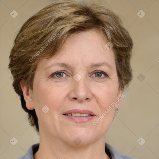 Joyful white adult female with short  brown hair and grey eyes