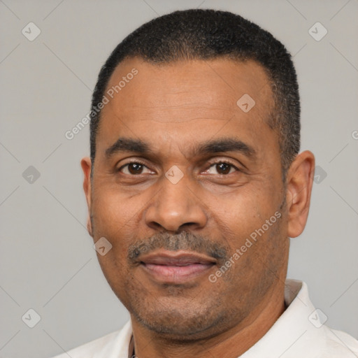 Neutral latino adult male with short  black hair and brown eyes