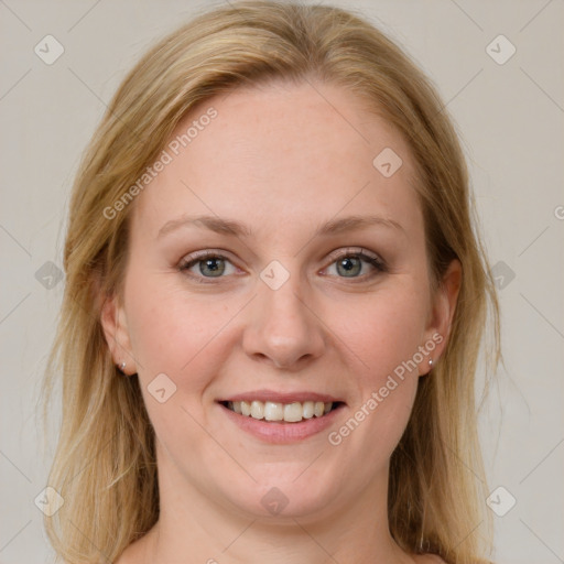 Joyful white young-adult female with medium  brown hair and blue eyes