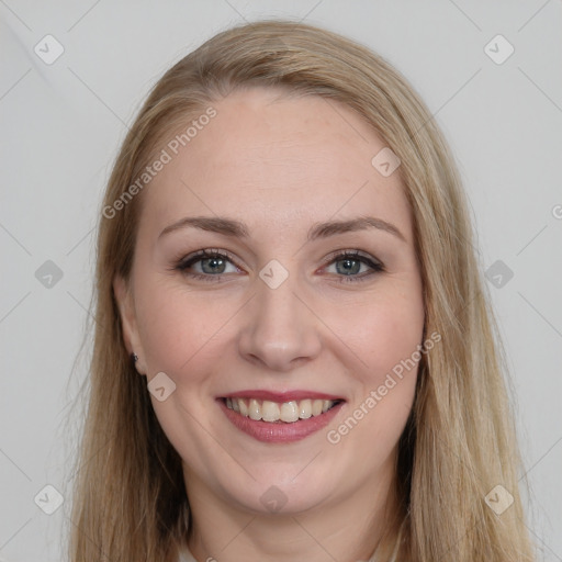 Joyful white young-adult female with long  brown hair and grey eyes