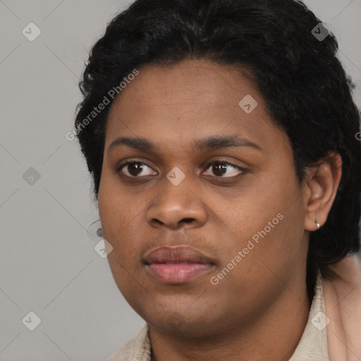 Joyful black young-adult female with short  black hair and brown eyes