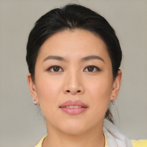 Neutral asian young-adult female with medium  brown hair and brown eyes