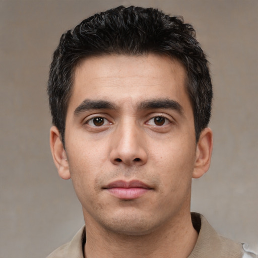 Neutral white young-adult male with short  black hair and brown eyes