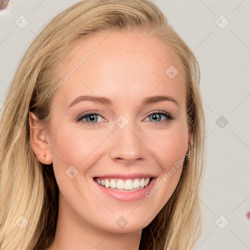 Joyful white young-adult female with long  brown hair and grey eyes