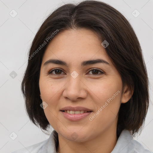 Joyful white adult female with medium  brown hair and brown eyes