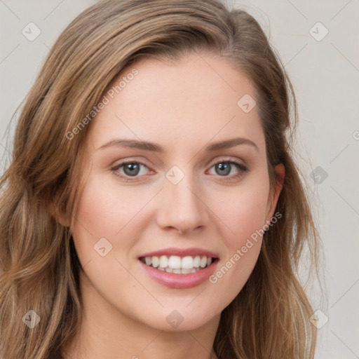 Joyful white young-adult female with long  brown hair and green eyes