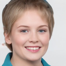 Joyful white child female with short  brown hair and grey eyes