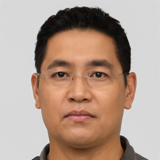 Neutral asian young-adult male with short  black hair and brown eyes