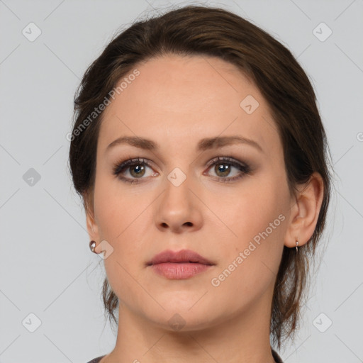 Neutral white young-adult female with medium  brown hair and brown eyes