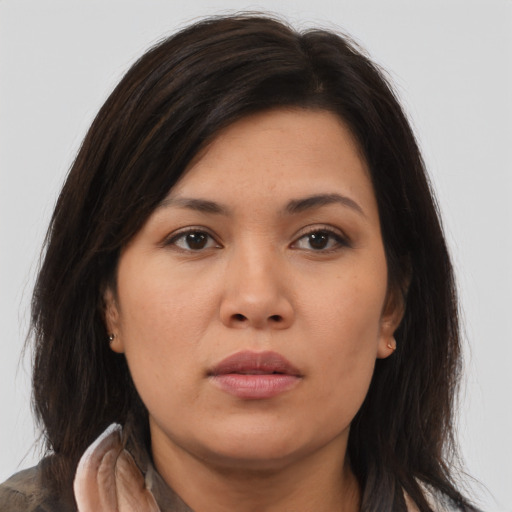 Neutral asian young-adult female with medium  brown hair and brown eyes