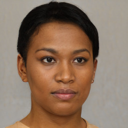 Neutral black young-adult female with short  black hair and brown eyes