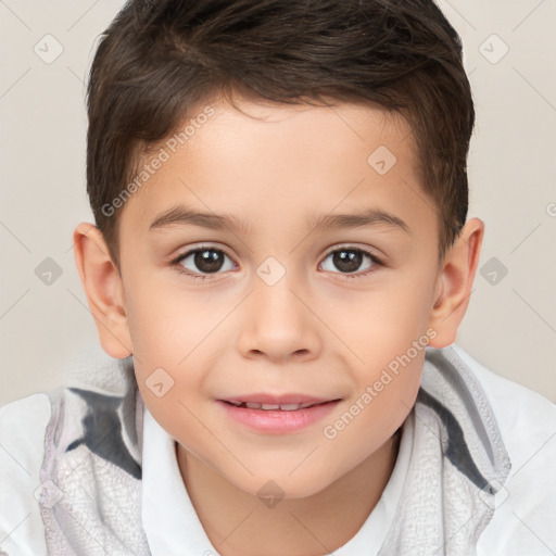 Joyful white child male with short  brown hair and brown eyes