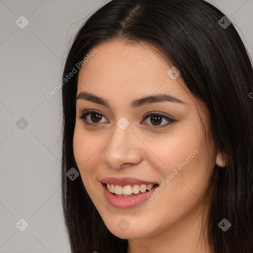 Joyful asian young-adult female with long  brown hair and brown eyes