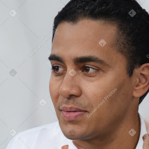 Neutral white young-adult male with short  black hair and brown eyes