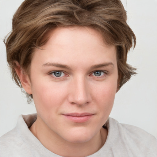 Joyful white young-adult female with medium  brown hair and blue eyes